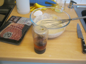 Pancake mix, bacon, Golden syrup (the maple got used up over the festivities). The pancake mix in this case: 300ml cup of milk, 300ml cup of Wholemeal flour, 1 egg, whisked together.